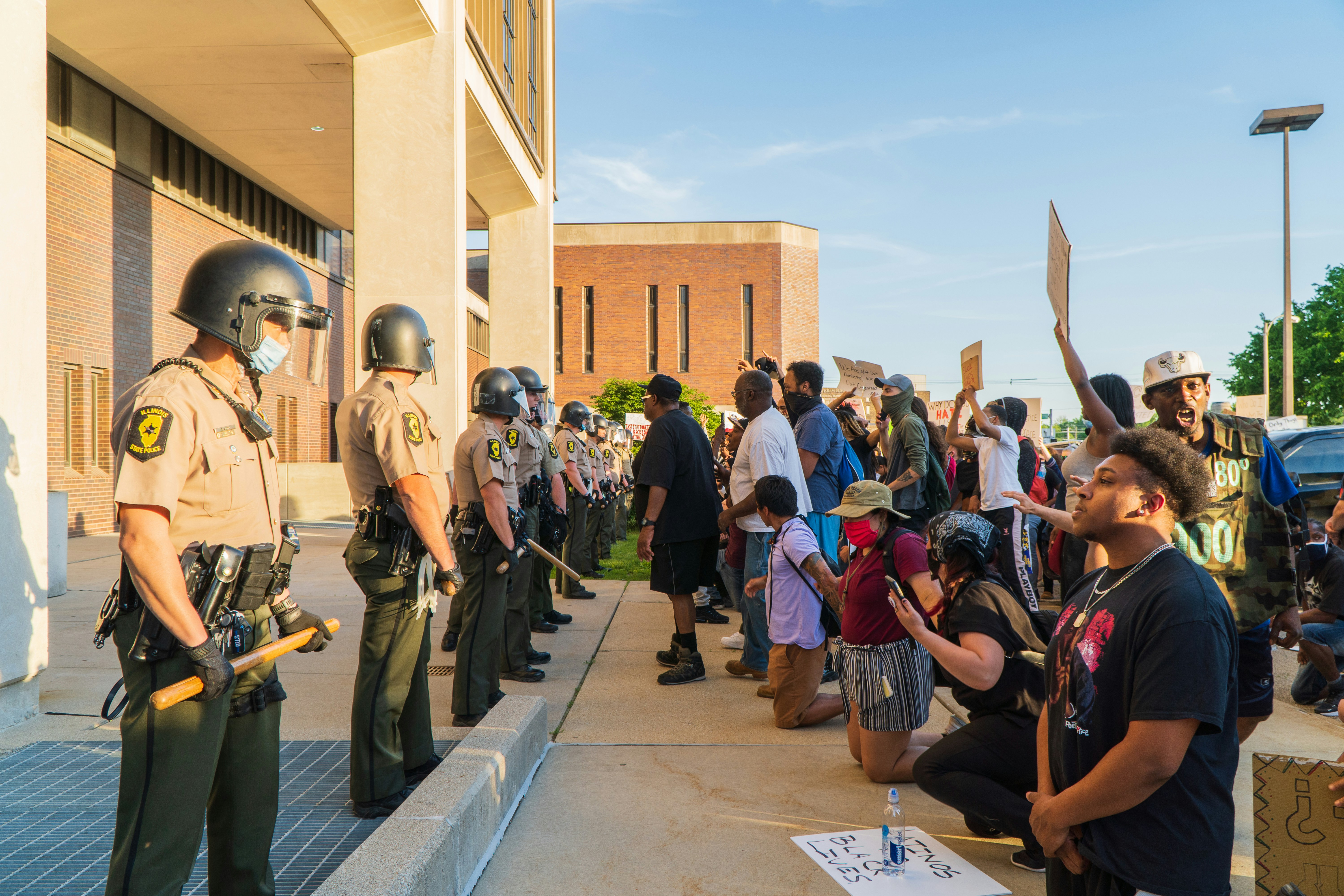 people in a street during daytime illinois zoom background