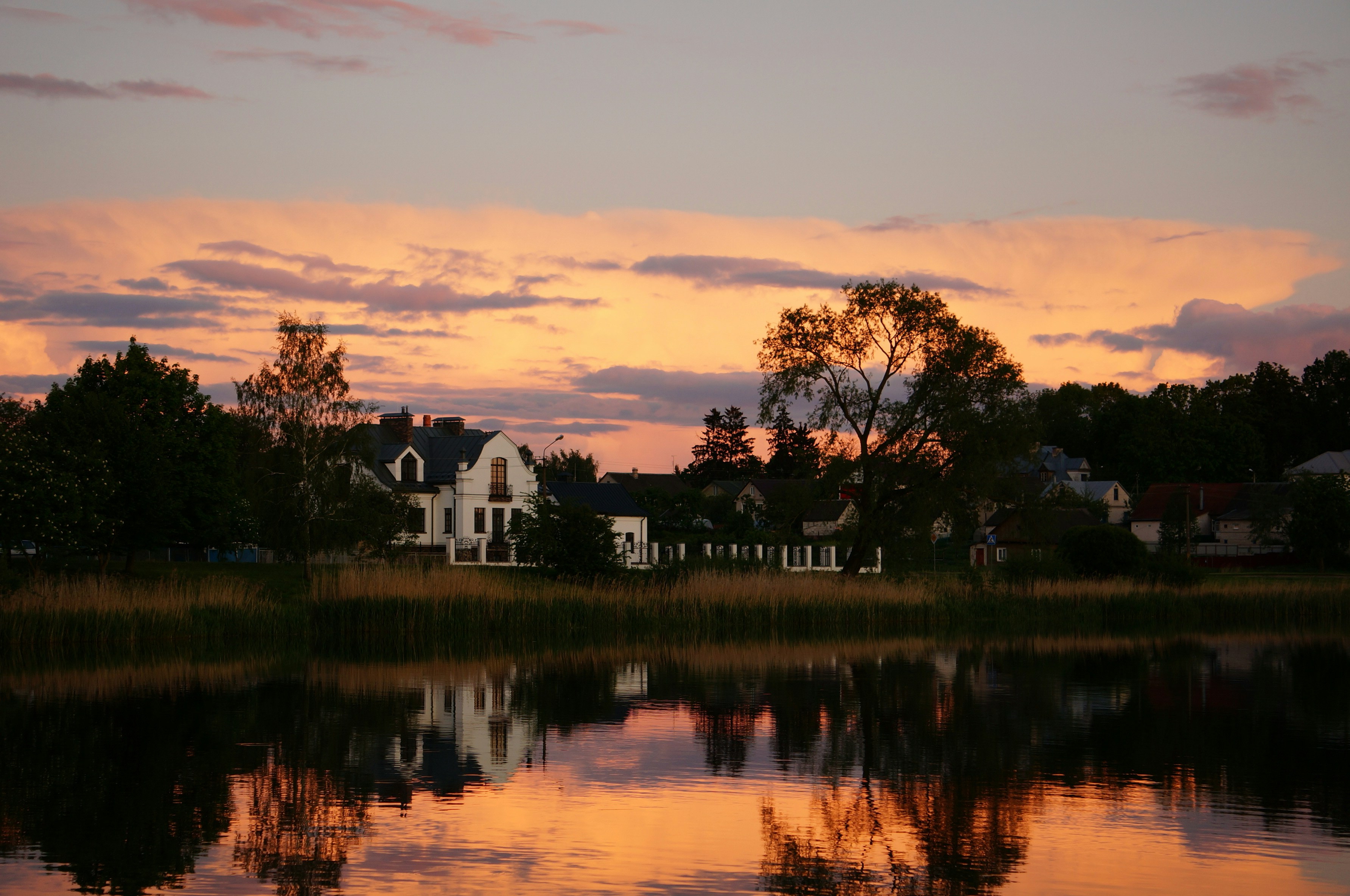 lakeside Acworth home at sunset - House Cleaning Services Acworth GA