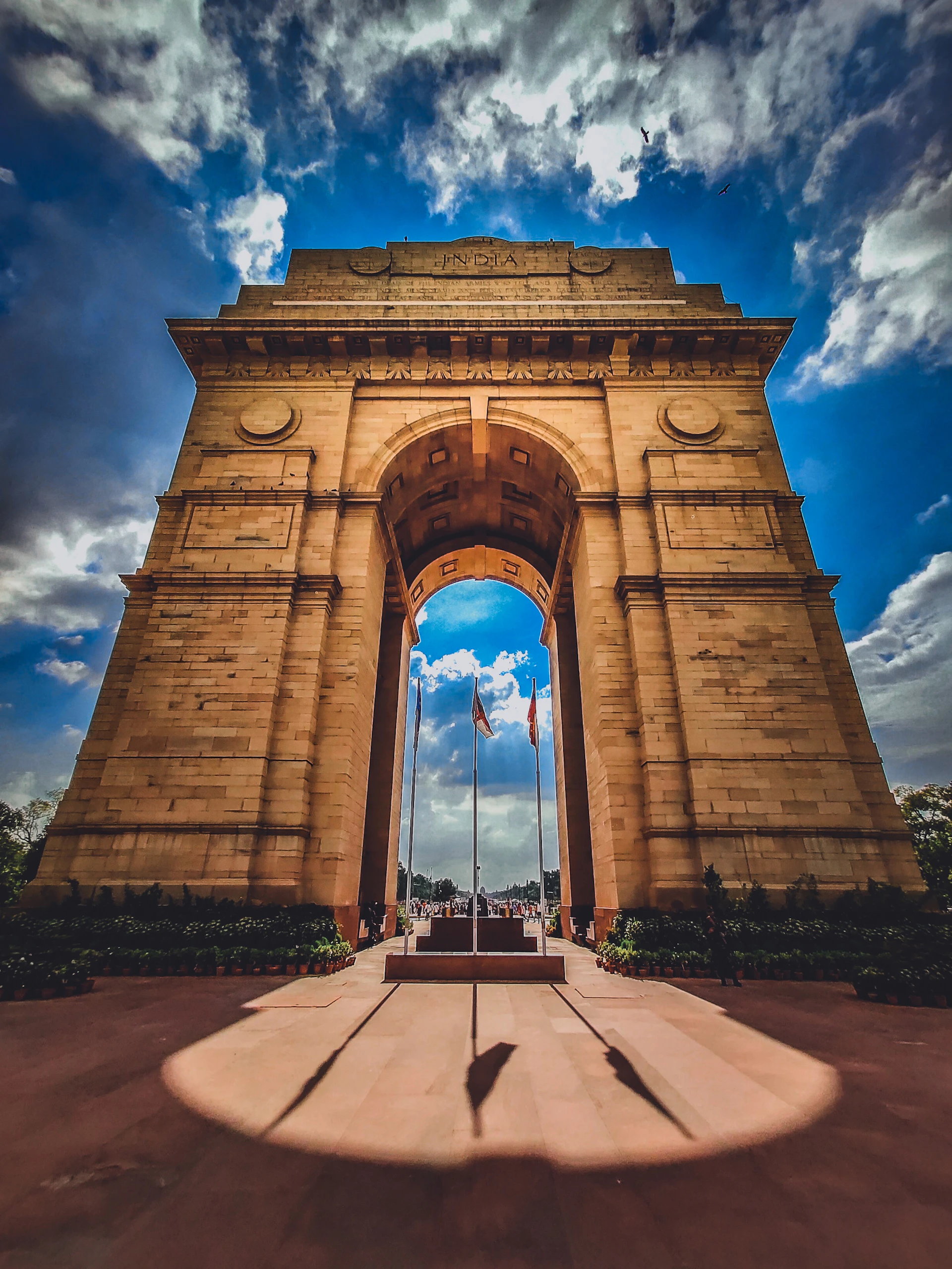brown concrete arch under blue sky during daytime