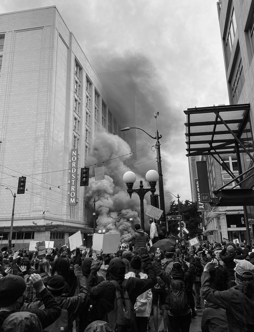 grayscale photo of people in a concert