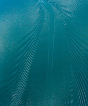 blue and white light in blue textile