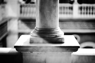 A subtle close-up of a classic architectural column, hinting at strong foundations and timeless wisdom.