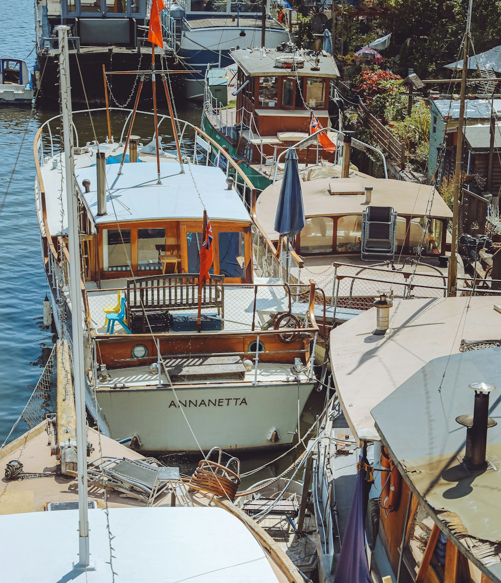 white and brown boat on sea during daytime