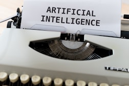 artificial intelligence white and black typewriter with white printer paper
