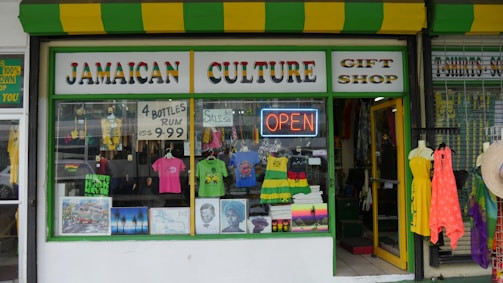 A vibrant storefront of Jamaal Shop bustling with happy customers.