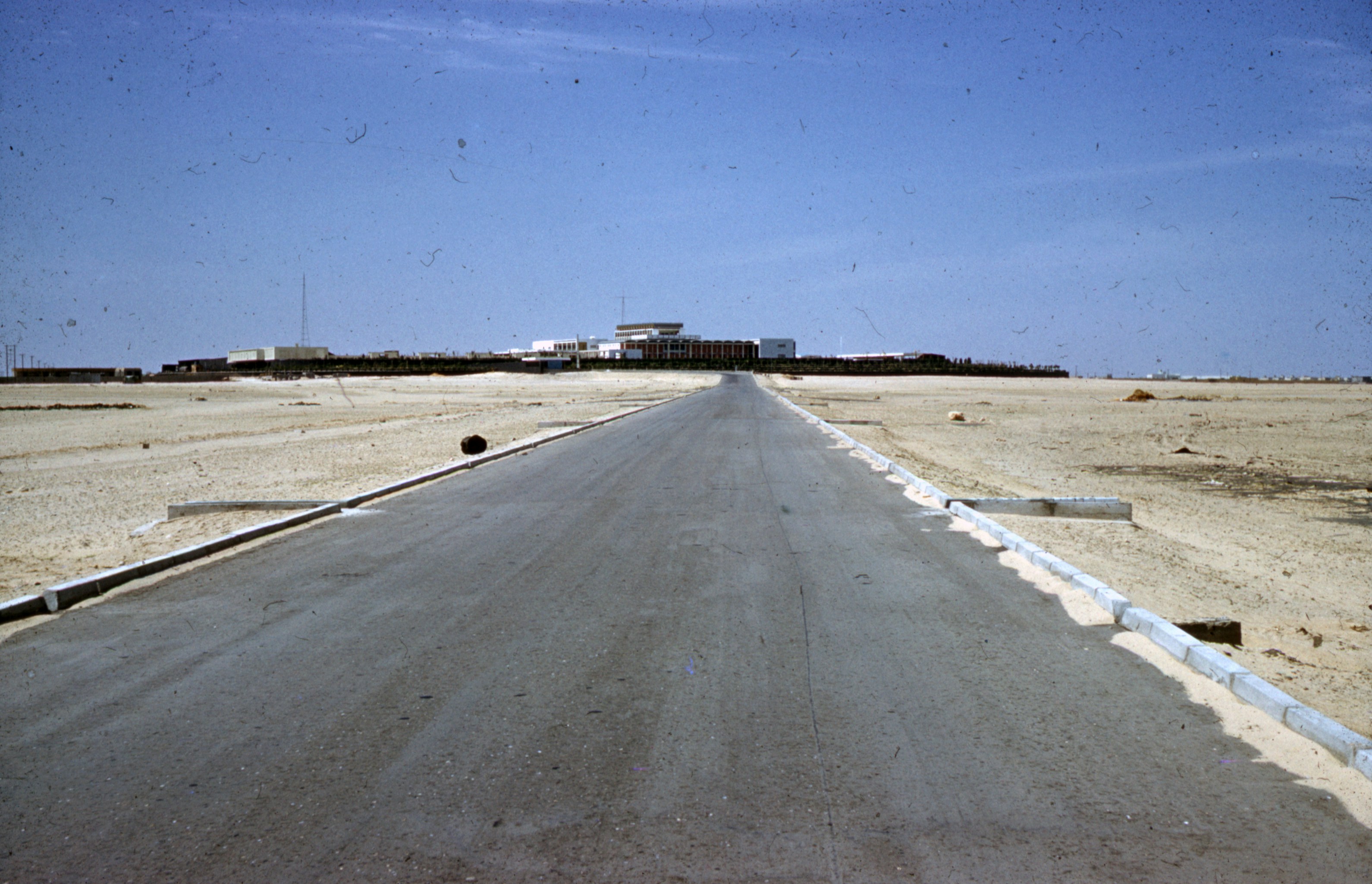 gray concrete road under blue sky during daytime, kuwait, old photo, old photograph, digitised slides, saudi arabia, 1950s, 1960s, 50s, 60s, vintage, arabia, uae, middle east, 