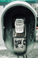 An outdoor setting featuring the Snow Phone in use, highlighting its rugged design.