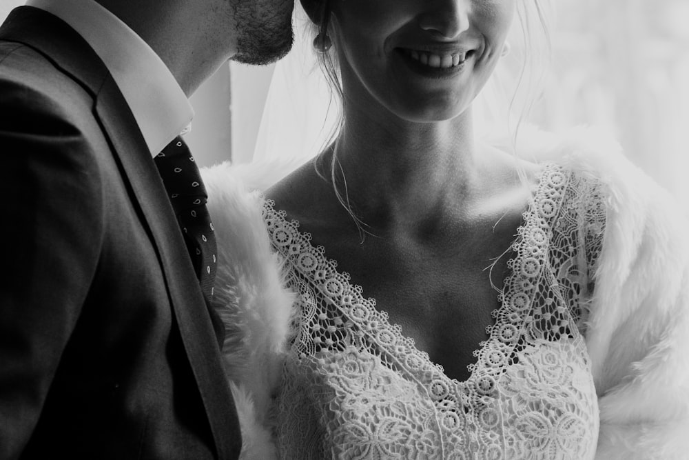 grayscale photo of woman in white floral lace top