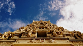brown concrete building under blue sky during daytime