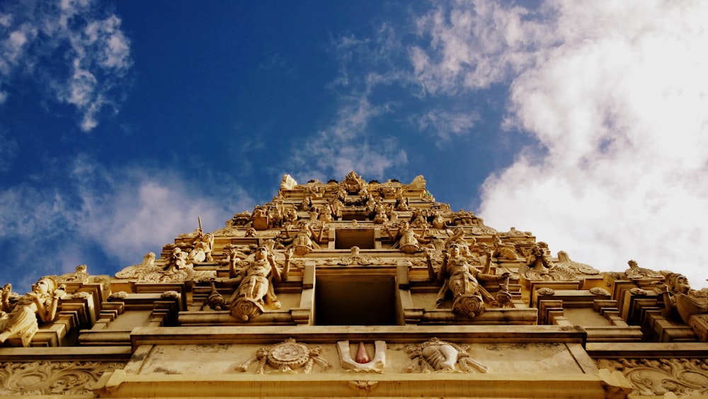 brown concrete building under blue sky during daytime