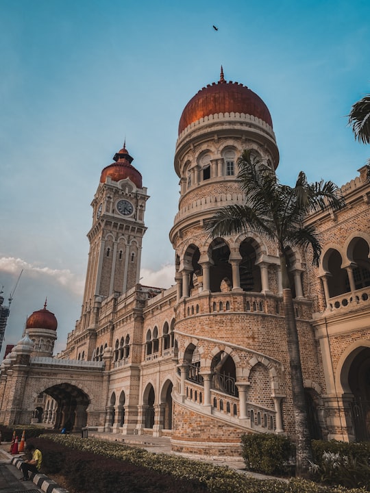 brown concrete building under blue sky during daytime in Bangunan Sultan Abdul Samad Malaysia