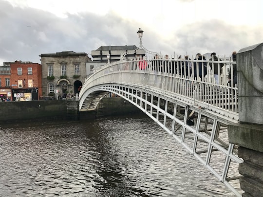white bridge over river during daytime in EPIC The Irish Emigration Museum Ireland