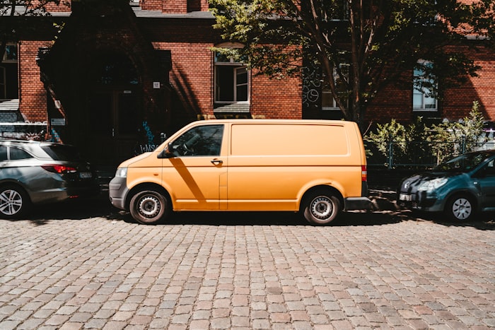 Courier van parked on a residential street