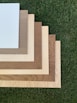 brown wooden frame on green grass
