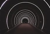 red and white tunnel with red carpet