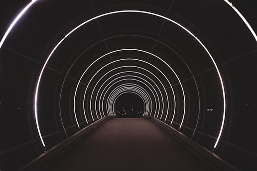 red and white tunnel with red carpet
