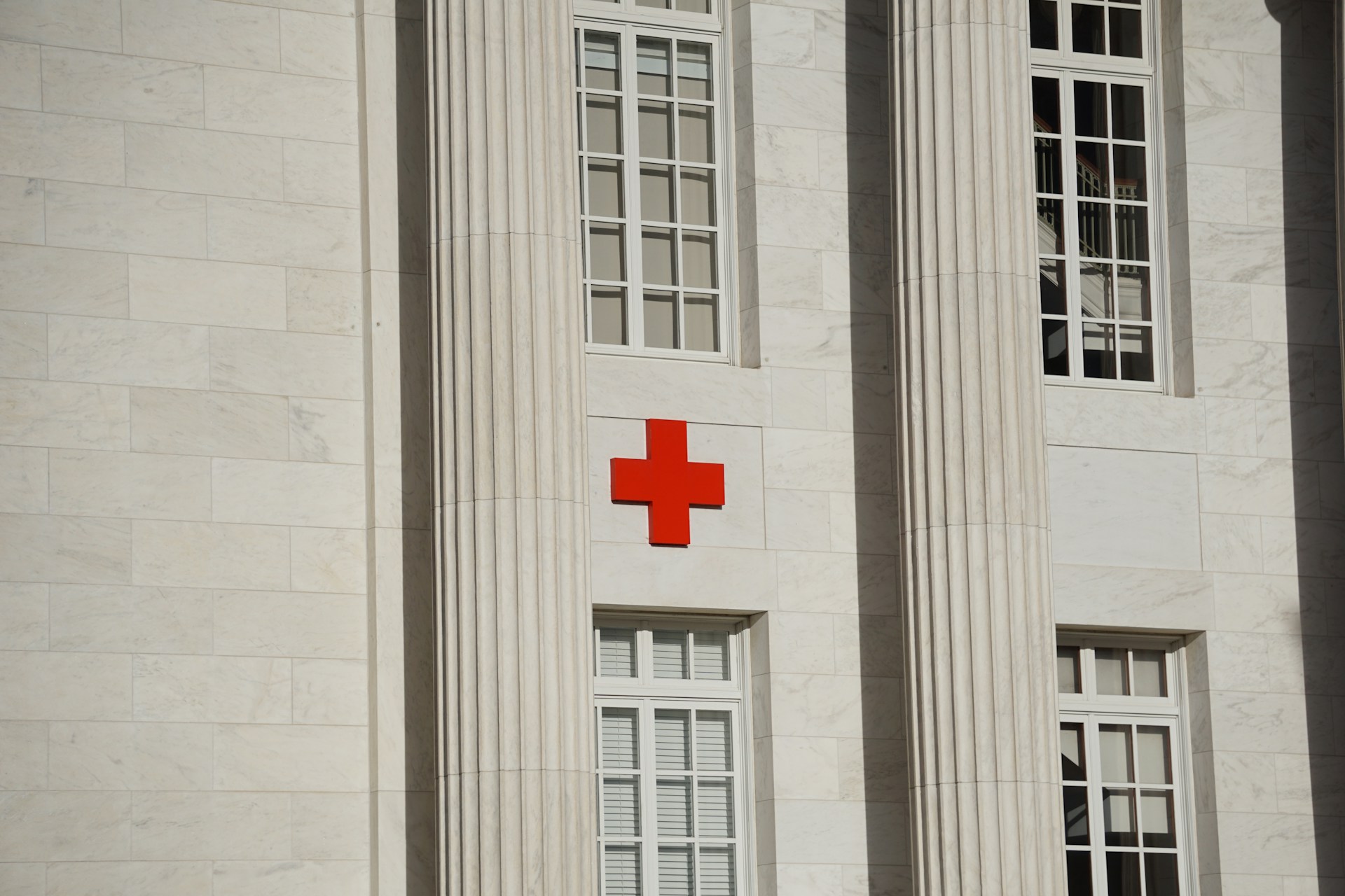 red cross on white concrete building