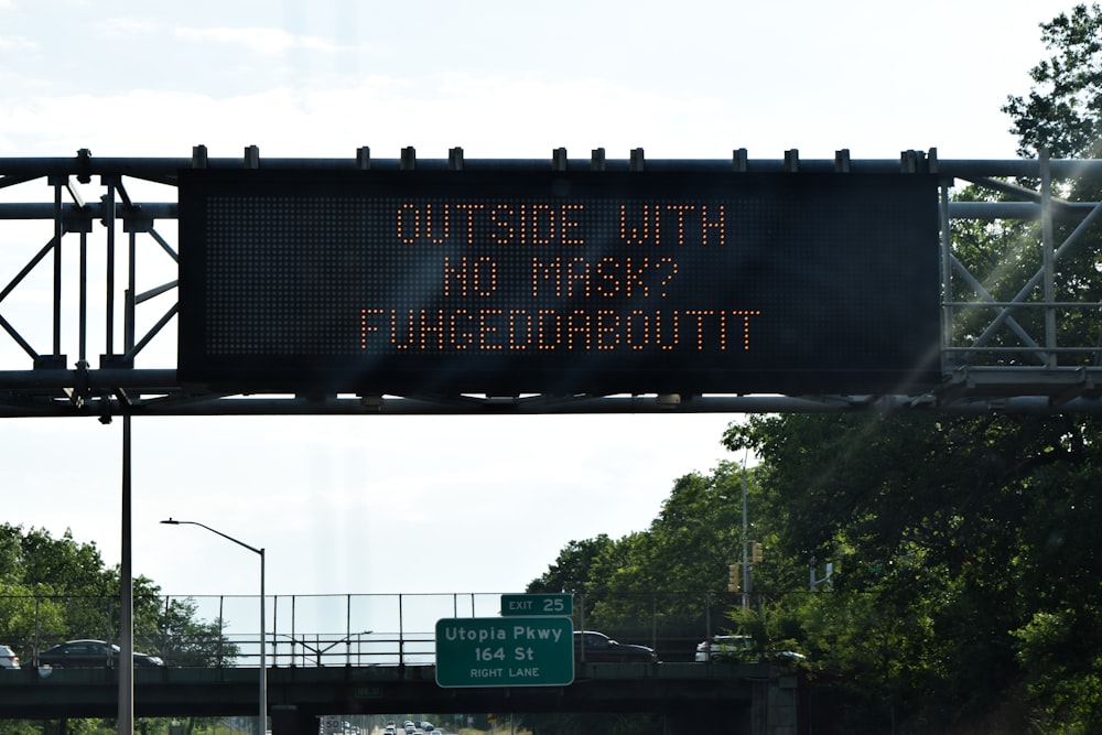 green and white road sign