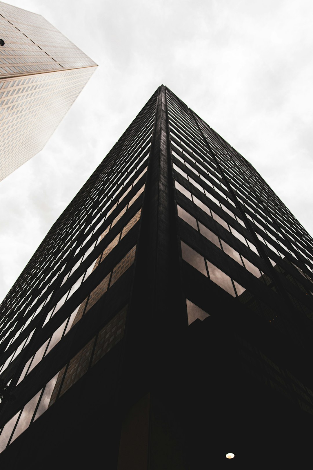 low angle photography of brown high rise building