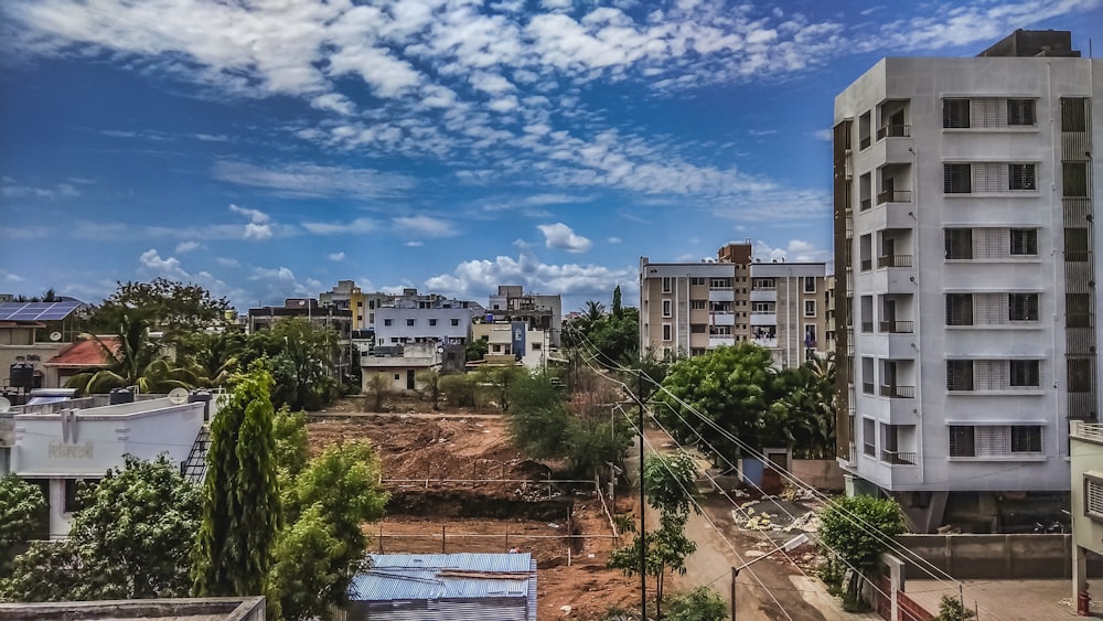 white concrete building under blue sky during daytime