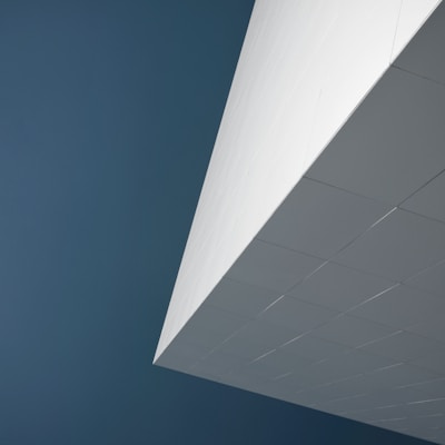 white concrete building under blue sky during daytime