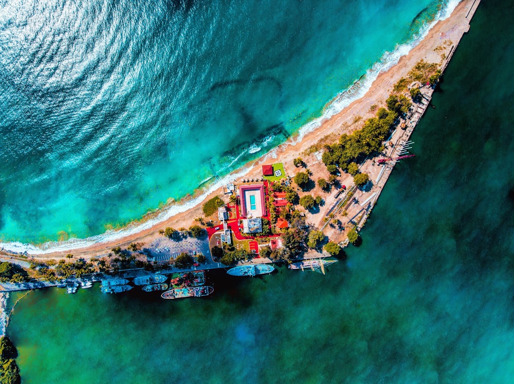 aerial view of city beside body of water during daytime