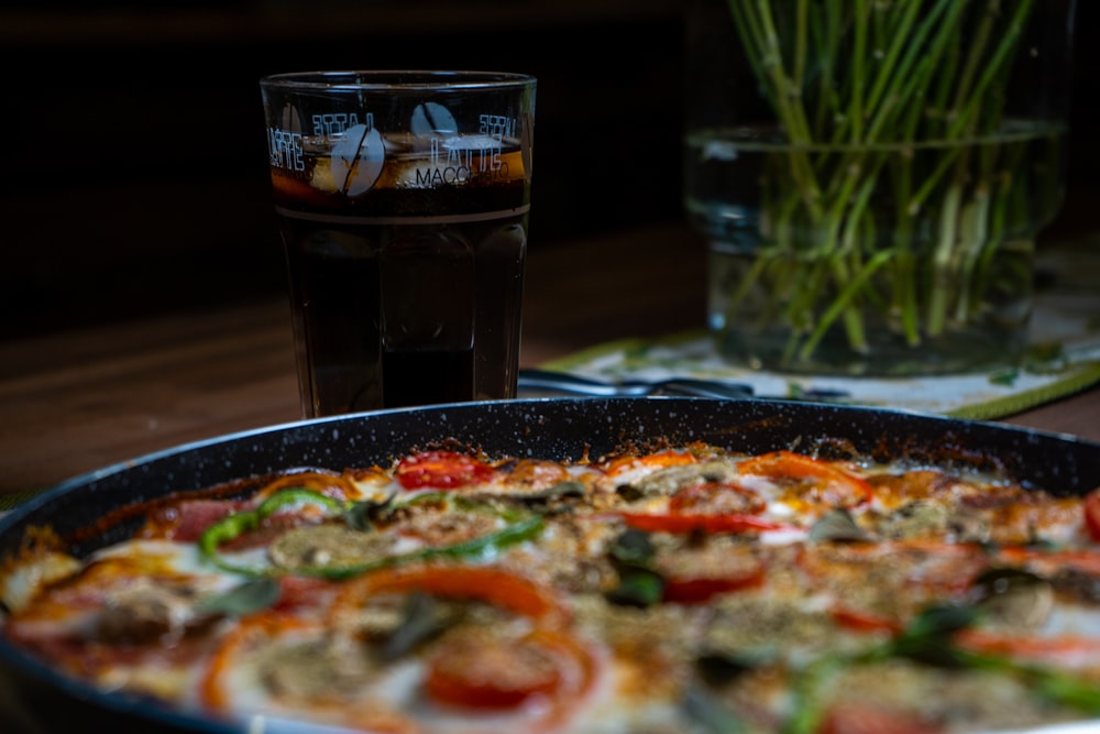 pizza on black ceramic plate