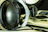 Close-up of a professional using Beatsphere Pro headphones during a video call.