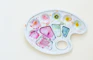 white pink and green floral ceramic plate