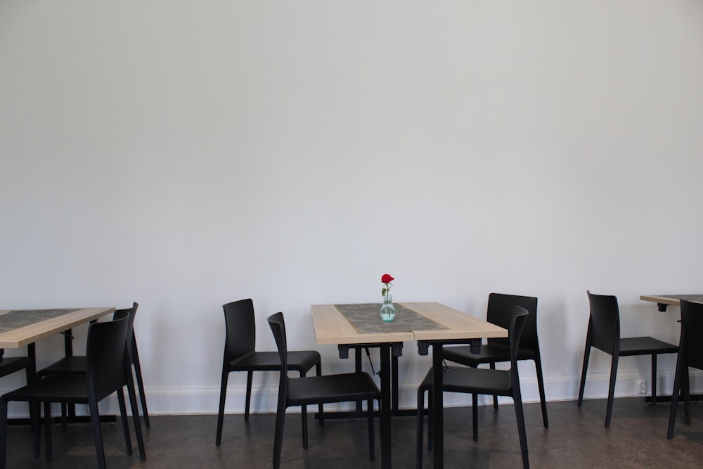 brown wooden table with chairs