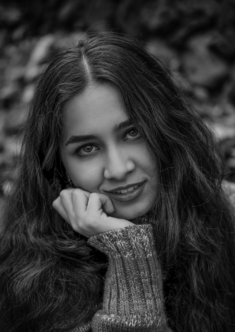 grayscale photo of woman smiling