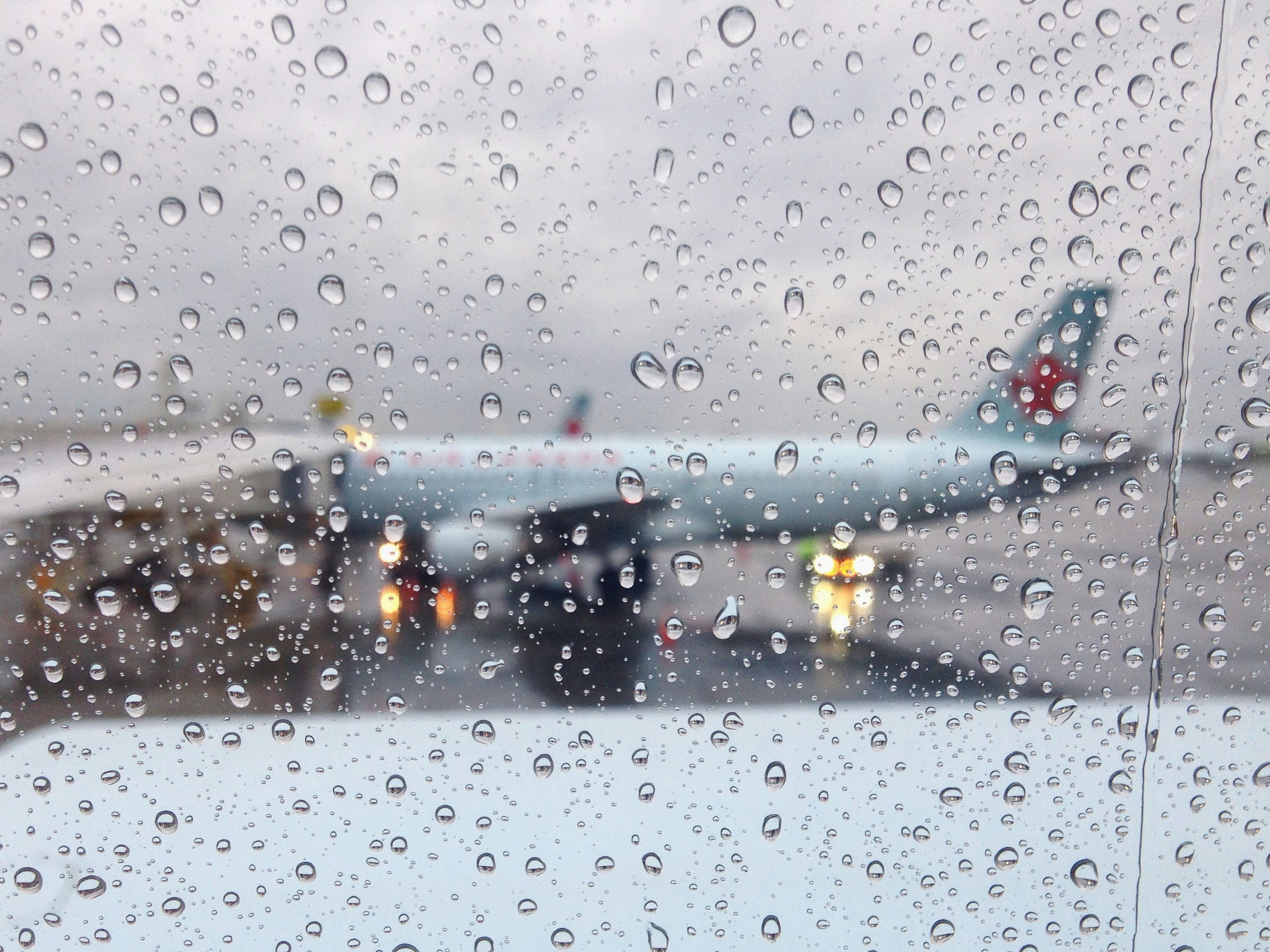 water droplets on glass window, One of my favourite parts of travel is the moment of excitement and anticipation in the plane when you are about to taxi to the runway and begin an adventure! 
