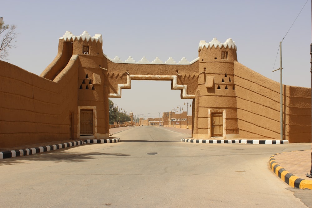 brown concrete building under blue sky during daytime