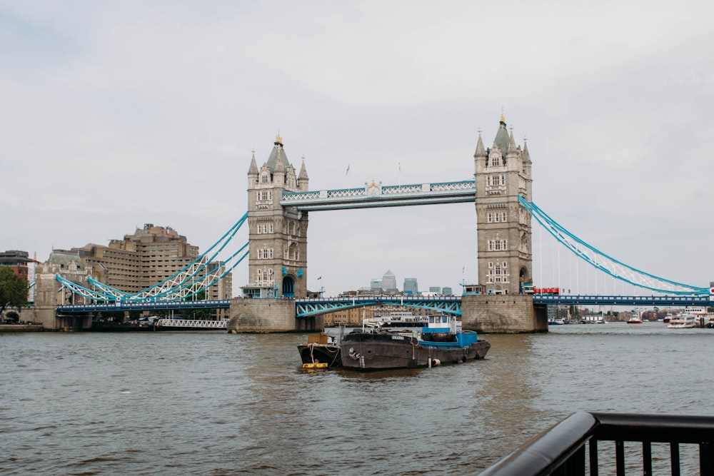 brown and gray bridge under white sky during daytime