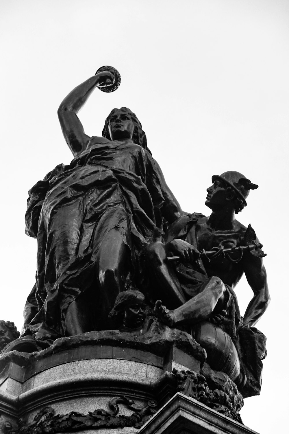 man in black suit statue