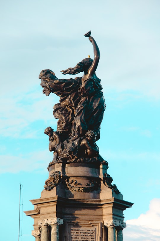 black statue of man with wings in Manaus Brasil