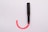 black and red tube on white surface