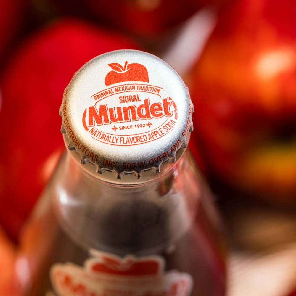 coca cola bottle cap on brown wooden table