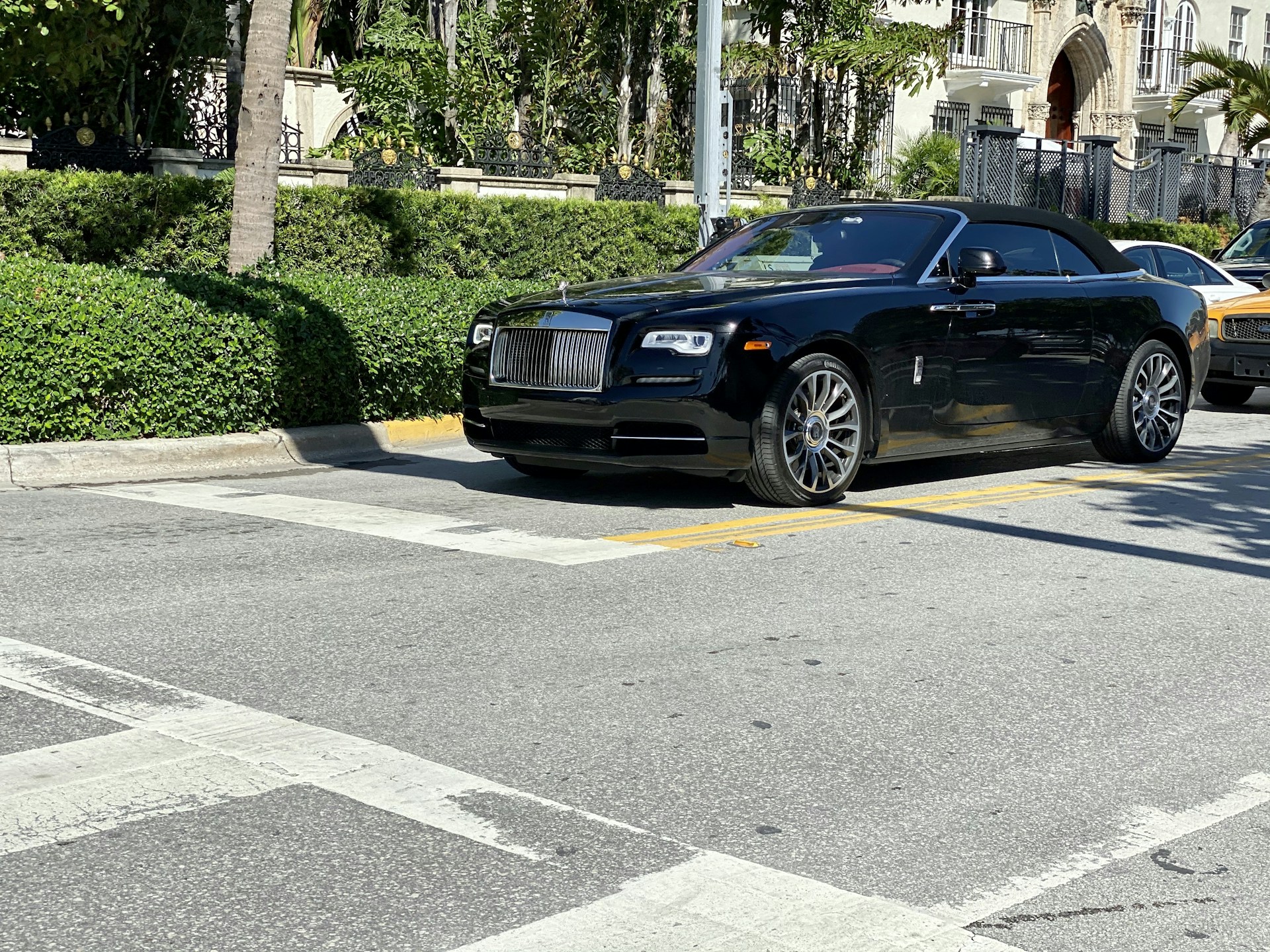 woman wearing yellow long-sleeved dress under white clouds and blue sky during daytime