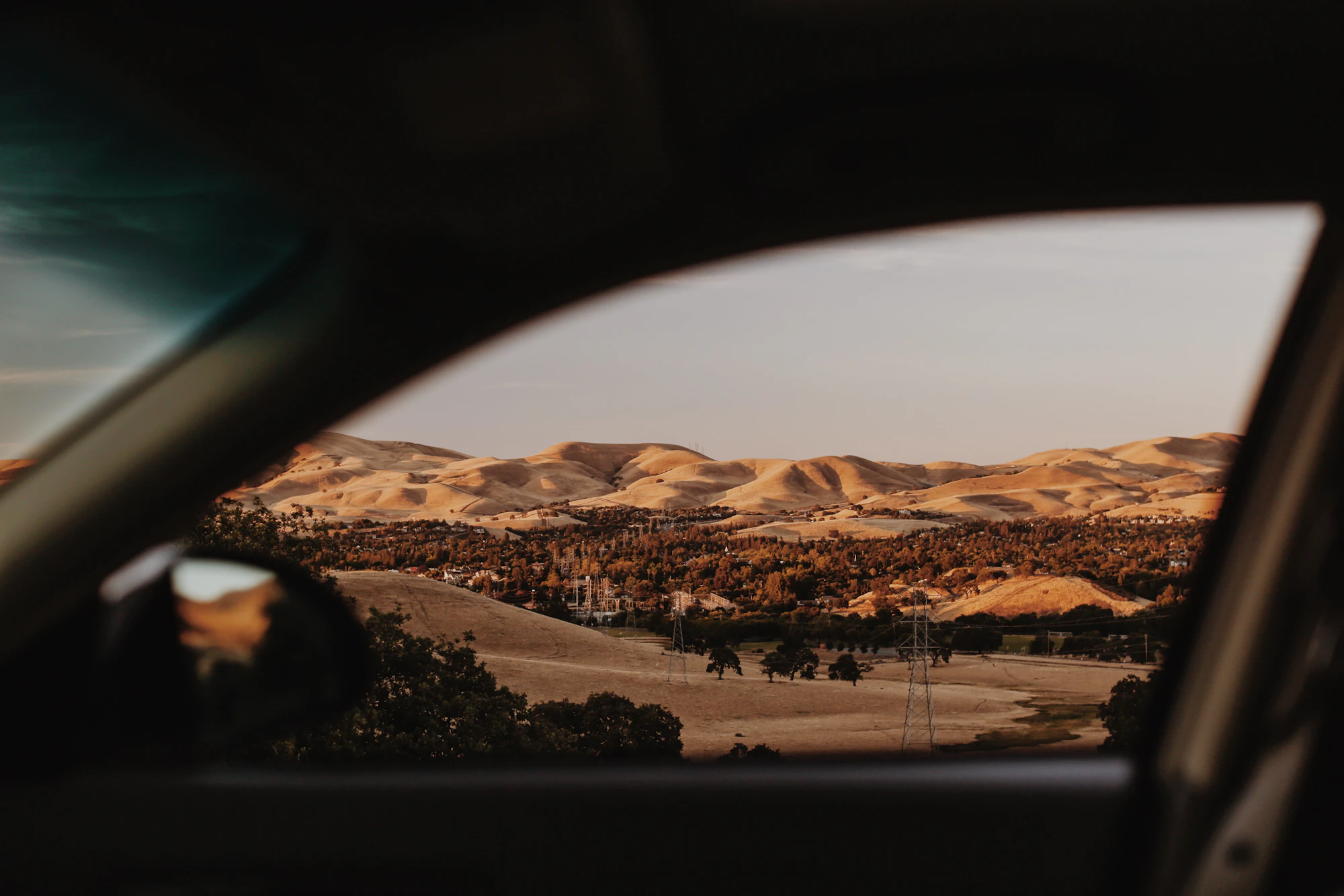 Desert hills seen through a car window