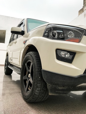 Close-up of a sleek white cargo van body with clean lines and reinforced panels.