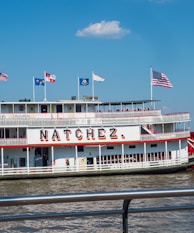 white and red ship on sea during daytime