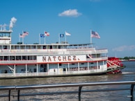 white and red ship on sea during daytime