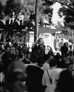 Portrait of a determined leader addressing a crowd in a new world.