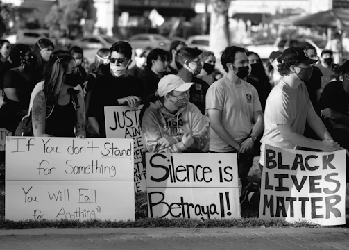 A group of activists collaborating on strategies to hold authorities accountable.