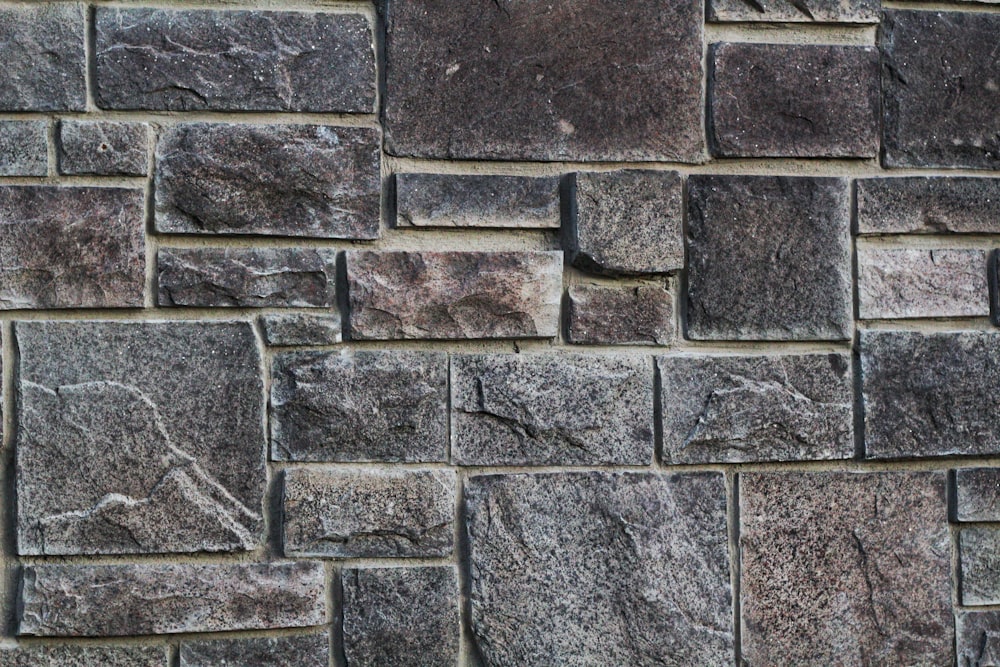 brown and gray brick wall