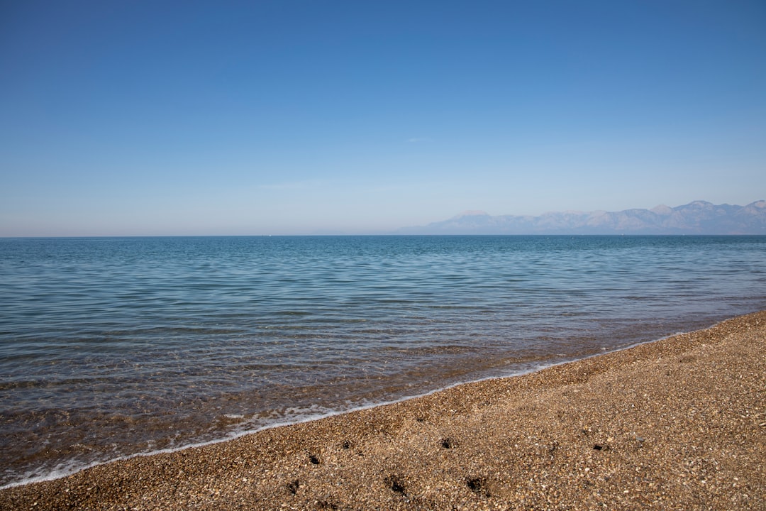 blue sea under blue sky during daytime