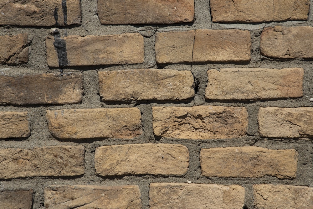 brown and gray brick wall