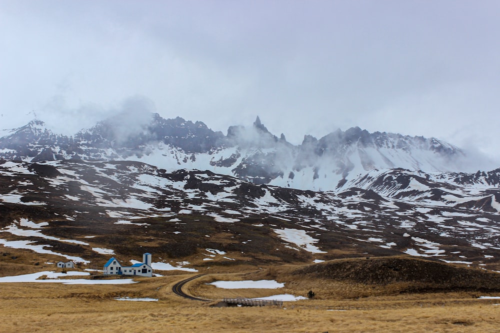 white and black mountains under white sky during daytime