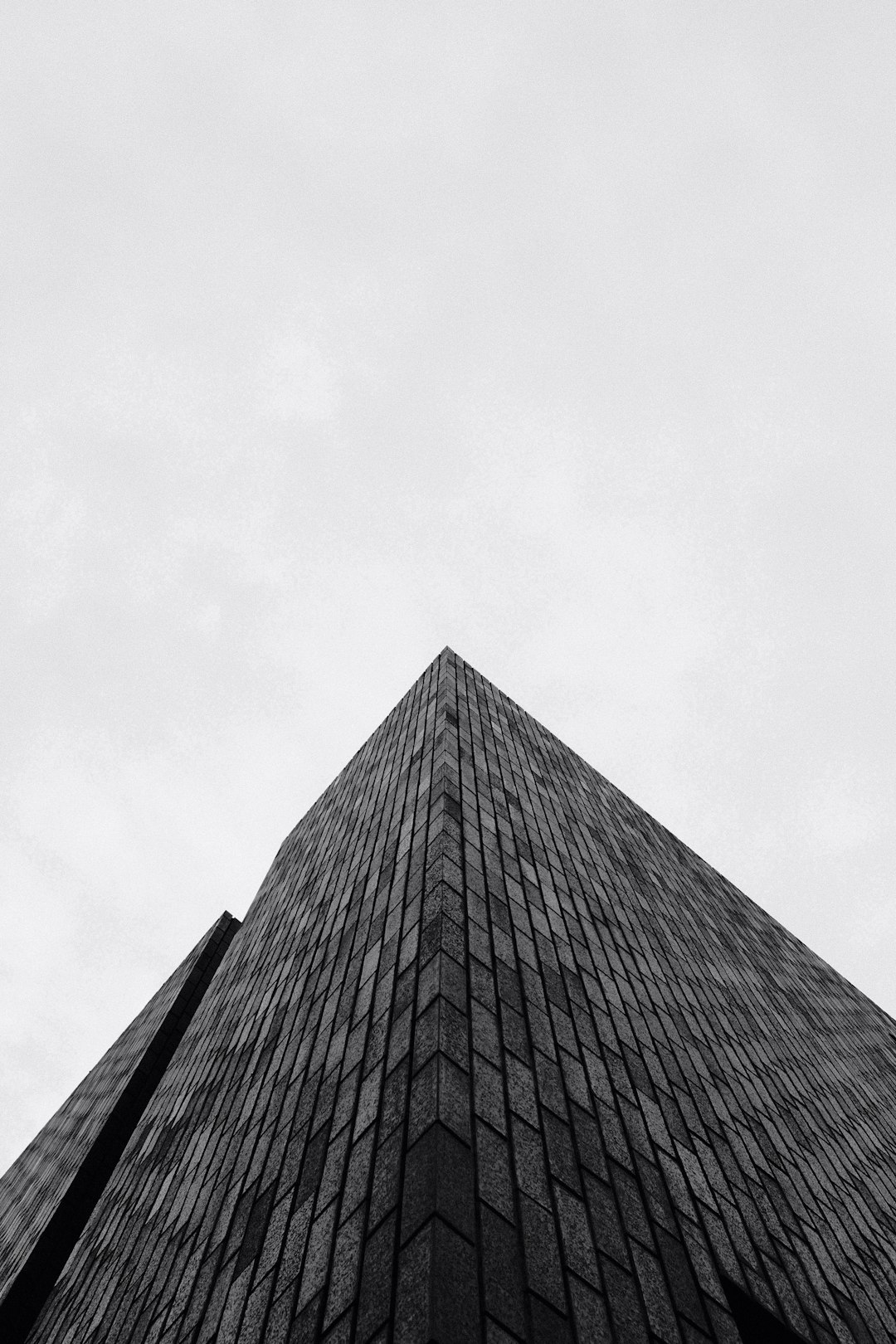 grayscale photo of high rise building